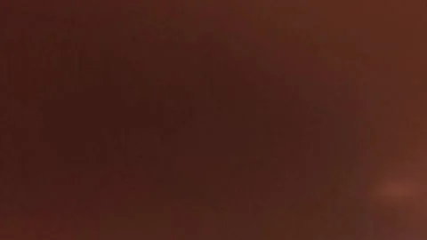 Red Square Centering in Warm Blurred Background Visual Stock Footage 328299191