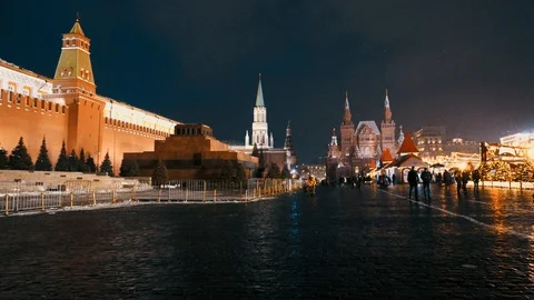 Red Square, Lenin Mausoleum, Kremlin Wall, traditional fair, panorama, evening Stock-Footage 102896249