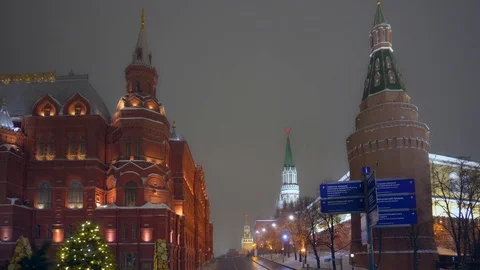 Red Square. Smooth forward movement. Kremlin clock with red star. Winter night Stock Footage 116723100