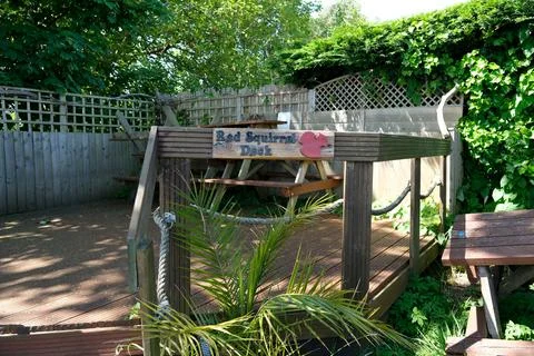 Red Squirrel themed decking at the Hideaway in Shanklin. Stock Photos
