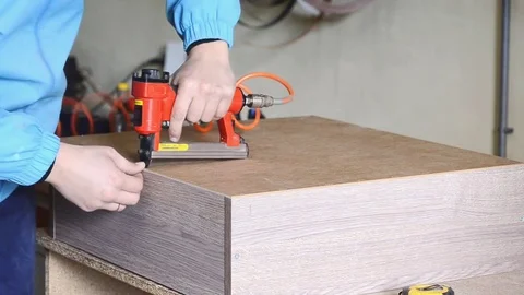 Red sroiteny pneumatic stapler Stock Footage 73874151