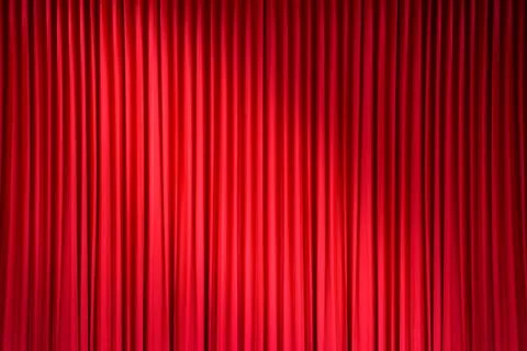 Red stage curtain with light spots Stock Photos