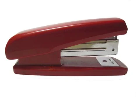 Red stapler isolated on the white background Stock Photos