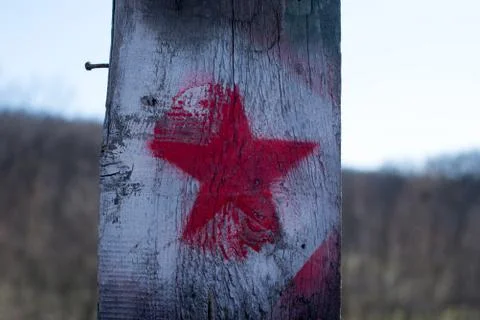 Red star on an ancient background Stock Photos