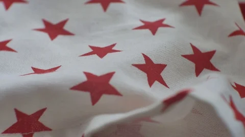Red star pattern on closeup white fabric craftsmanship,  Sewing needlework Stock Footage 109408382