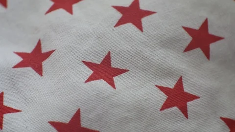 Red star pattern on closeup white fabric craftsmanship,  Sewing needlework Stock Footage 109408411