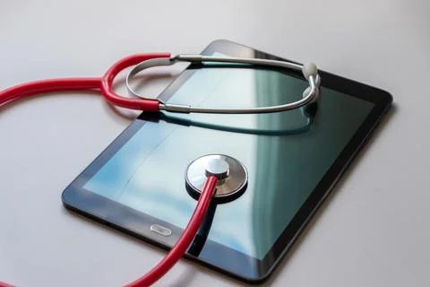 Red stethoscope on black tablet device shows cloud data security digital doctors Foto stock