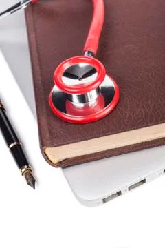 Red Stethoscope on Book Stock Photos
