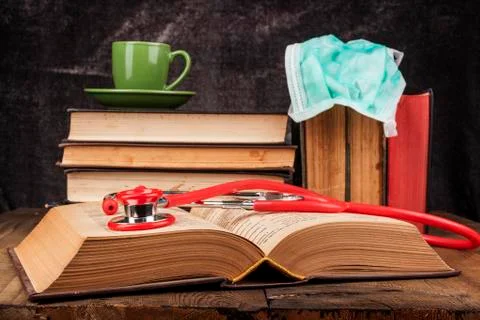 Red Stethoscope on Book Stock Photos