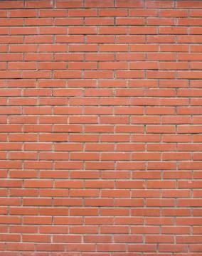 Red stone bricks wall pattern texture background seamless vertical Stock Photos