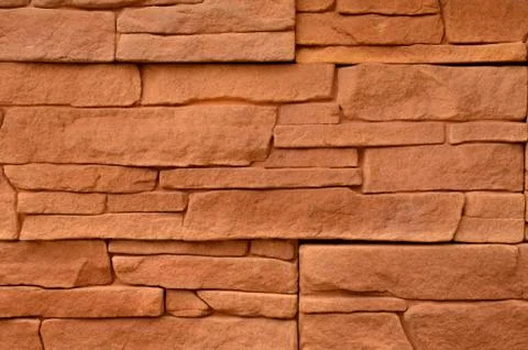 Red stone cladding texture Stock Photos