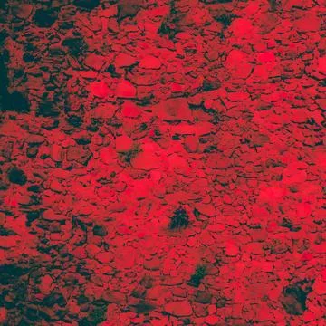 Red stone wall texture with abstract rock pattern Foto stock