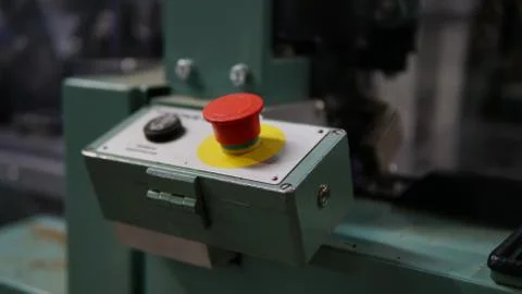 Red stop button for industrial process with another button 写真素材
