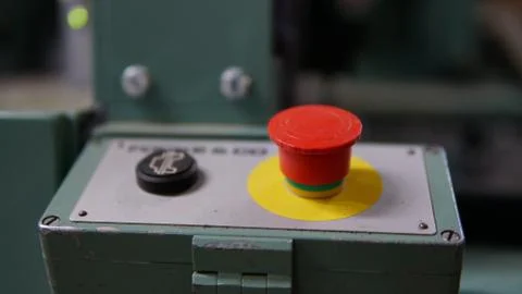 Red stop button for industrial process with another button Foto stock