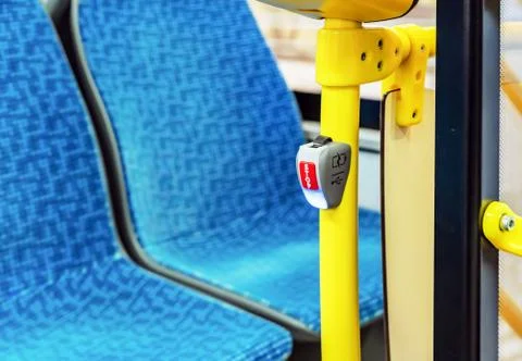 Red stop button in public transport. Stock Photos