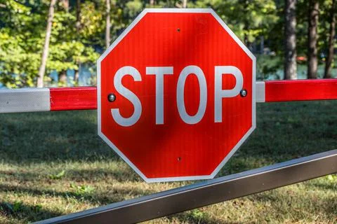 Red stop sign on a gate Stock Photos