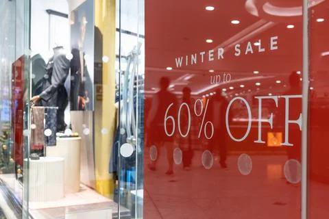 Red Store Window Sign With Sixty Percent Off Discount Stock Photos