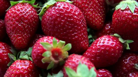 Red strawberries clockwise rotation Stock Footage 24878374