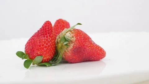 Red strawberries close rotating view, view of red color fresh strawberries Stock Footage 148216869