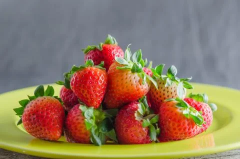 Red strawberries on dish Stock Photos