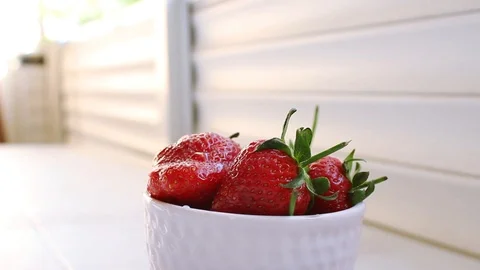 Red strawberries with drop of water. Stock Footage 107743477