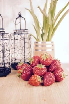 Red strawberries in kitchen Stock Photos