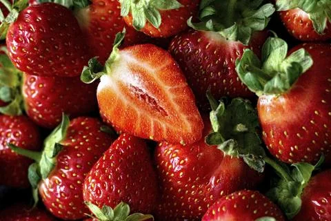 Red strawberry patterned background summer wallpaper Stock Photos