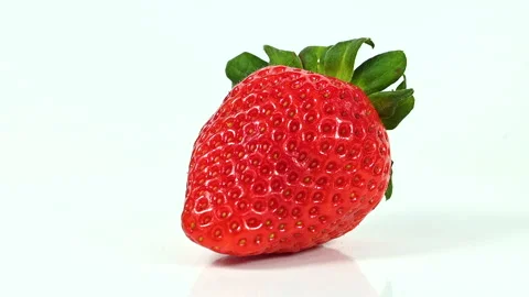 Red strawberry on white background macro closeup Stock-Footage 301570004