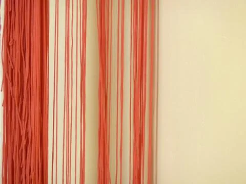 Red string curtain Stock Photos