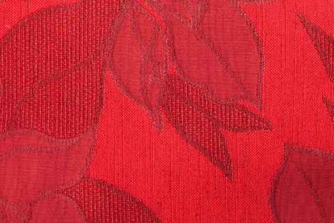 Red strings forming a flower on a red base Stock Photos