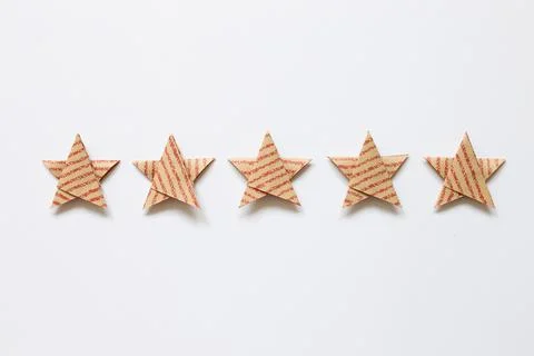 Red stripe pattern brown five stars quality rating on white background Foto stock