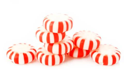 Red striped peppermints on a white background Stock Photos