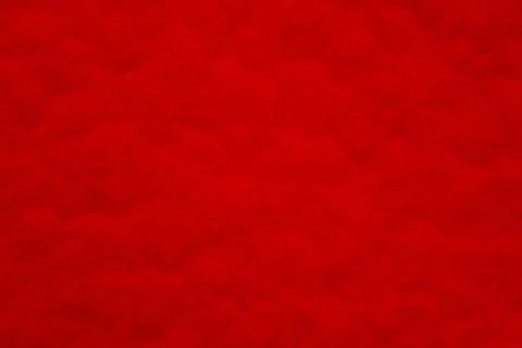 Red structured background with vignetting, darkening at the edges of the photo. Foto stock