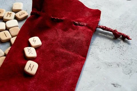 Red suede, leather bag. Handiwork. For runes, cards. Stock Photos