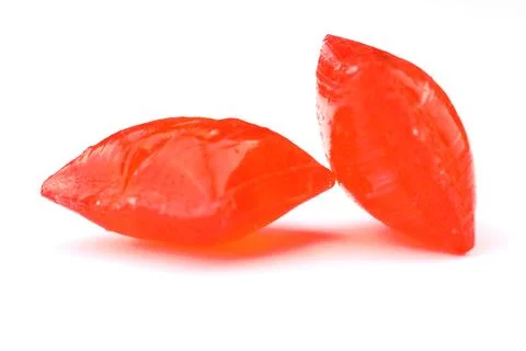 Red sugar on a white background. Ramadan Feast candy. Stock Photos