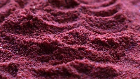 Red sumac spice powder circle rotation close up Stock Footage 265246781