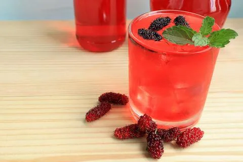 Red summer refreshing, fresh summer drinks with ice cubes, mint Stock Photos