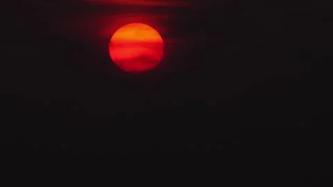 Red sun in the black sky Video stock 241468505