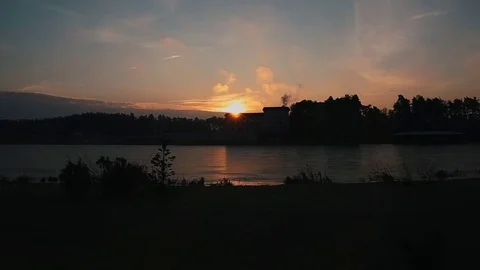 Red sun disk rises above the city Stock Footage 84208901