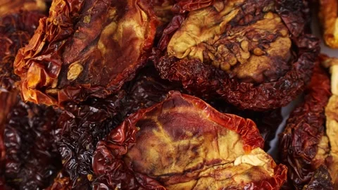 Red sun dried tomatoes circle rotation close up Video stock 278397630