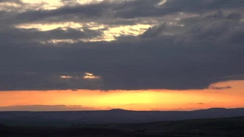 Red sun dusk above Chad cloud layers fiery evening - Stormy Sky and Cloud Field Stock Footage 339571105