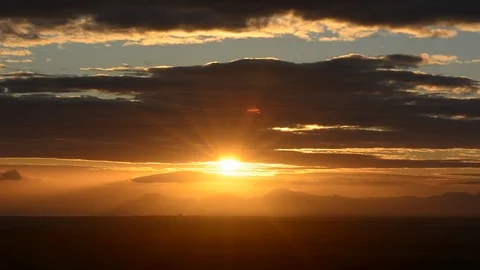 Red sun over the clouds Stock Footage 96236358