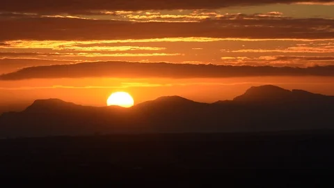 Red sun over the mountains Stock Footage 96236359