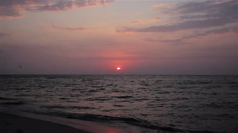 Red sun over the sea Stock Footage 68457732