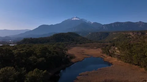 Red sun rising through the mountains Video stock 240483465