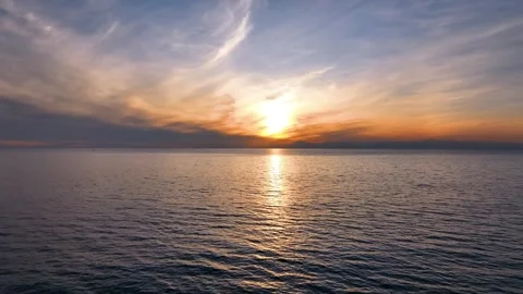 Red sun rising through the mountains Stock Footage 240484203