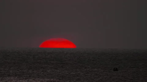 Red sun in the sea, sunset Video stock 218497891