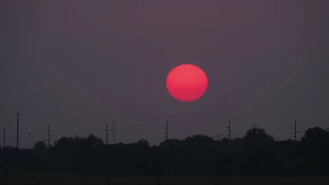 Red sun on the sunset Above Summer Landscape of the country . Time lapse video Stock Footage 314677962