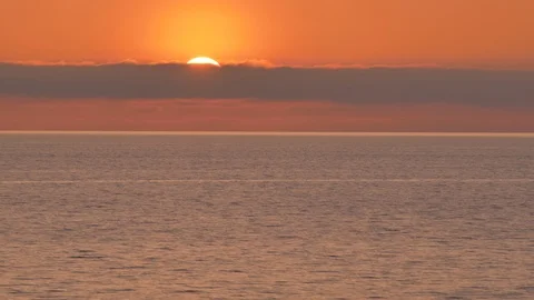 Red sun timelapse on the sea. Video stock 97741493