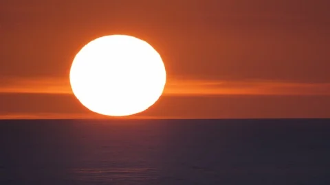 Red sun timelapse on the sea. Stock Footage 97741513